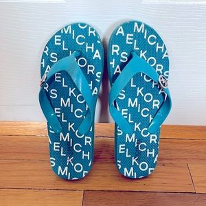 teal blue flip flops size 3. Only worn a few times.